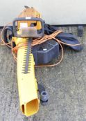A Mculloch electric chainsaw, together with an Alco leaf blower