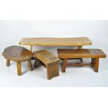 Four contemporary wooden benches, of assorted woods and designs, three with carved details,