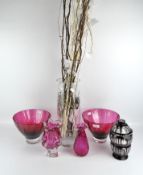 A selection of mostly cranberry-coloured glassware including two fluted bowls, height 17cm,