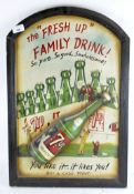 A vintage 7Up advertising plaque,