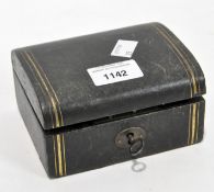 An antique trinket box with hinged lid and black leatherette covering,