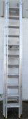 A large extendable three section ladder together with a folding step ladder