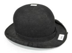A antique wool felt bowler hat, interior leather band marked 'The Filtra Ventilated Band',