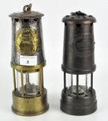 Two miners lamps,