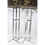 Two contemporary clothing rails, of geometric design with four branches, adjustable height,