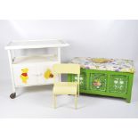 A green painted and upholstered blanket box, a painted serving trolley together with a child's chair