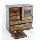 An Japanese parquetry table top cabinet,