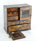 An Japanese parquetry table top cabinet,
