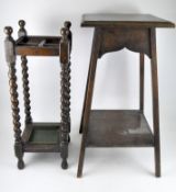 A late 19th/early 20th century occasional table with a Victorian mahogany stick and umbrella stand