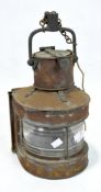 A ship's copper masthead lamp, bearing plaque marked 'Masthead Patt.25A', height 41cm.