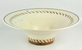 A Keith Murray Wedgwood bowl, in cream glaze with brown painted decoration,