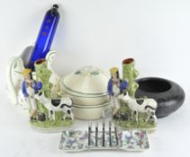 A pair of Staffordshire figures together with a pair of Susie Cooper tureens and a toast rack