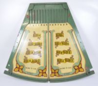 A large vintage fairground game, featuring a ball game,
