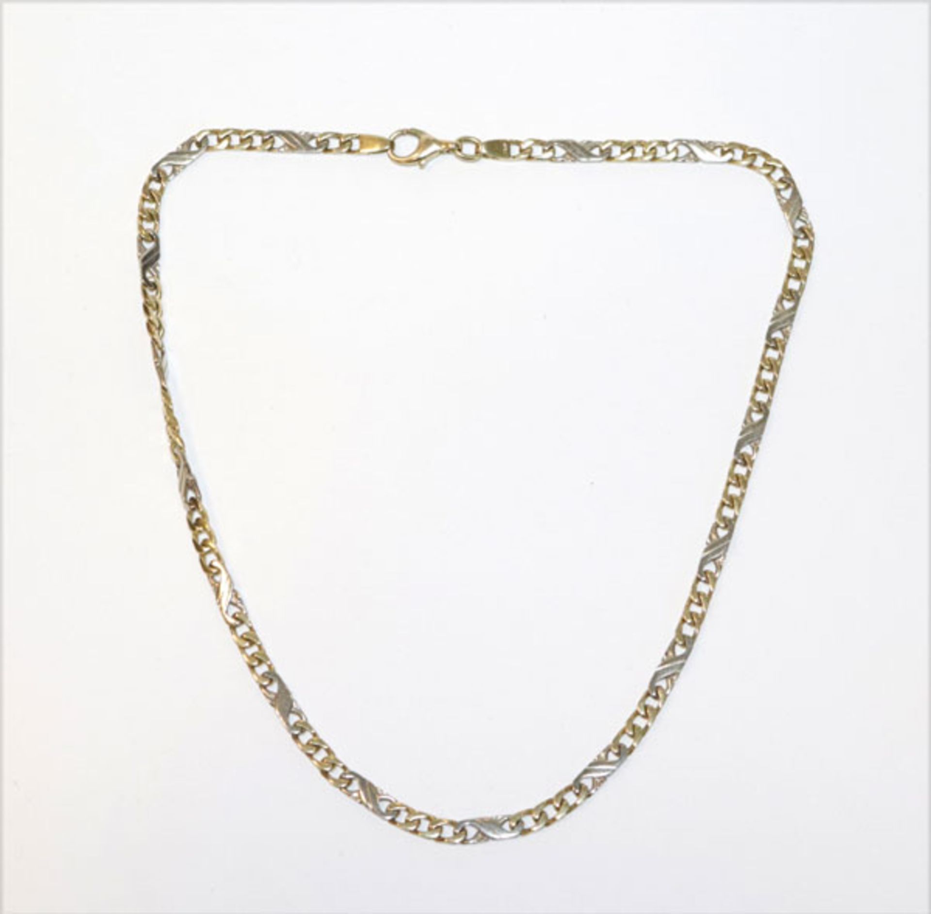 14 k Gelb- und Weißgold Kette, 22,6 gr., L 40 cm