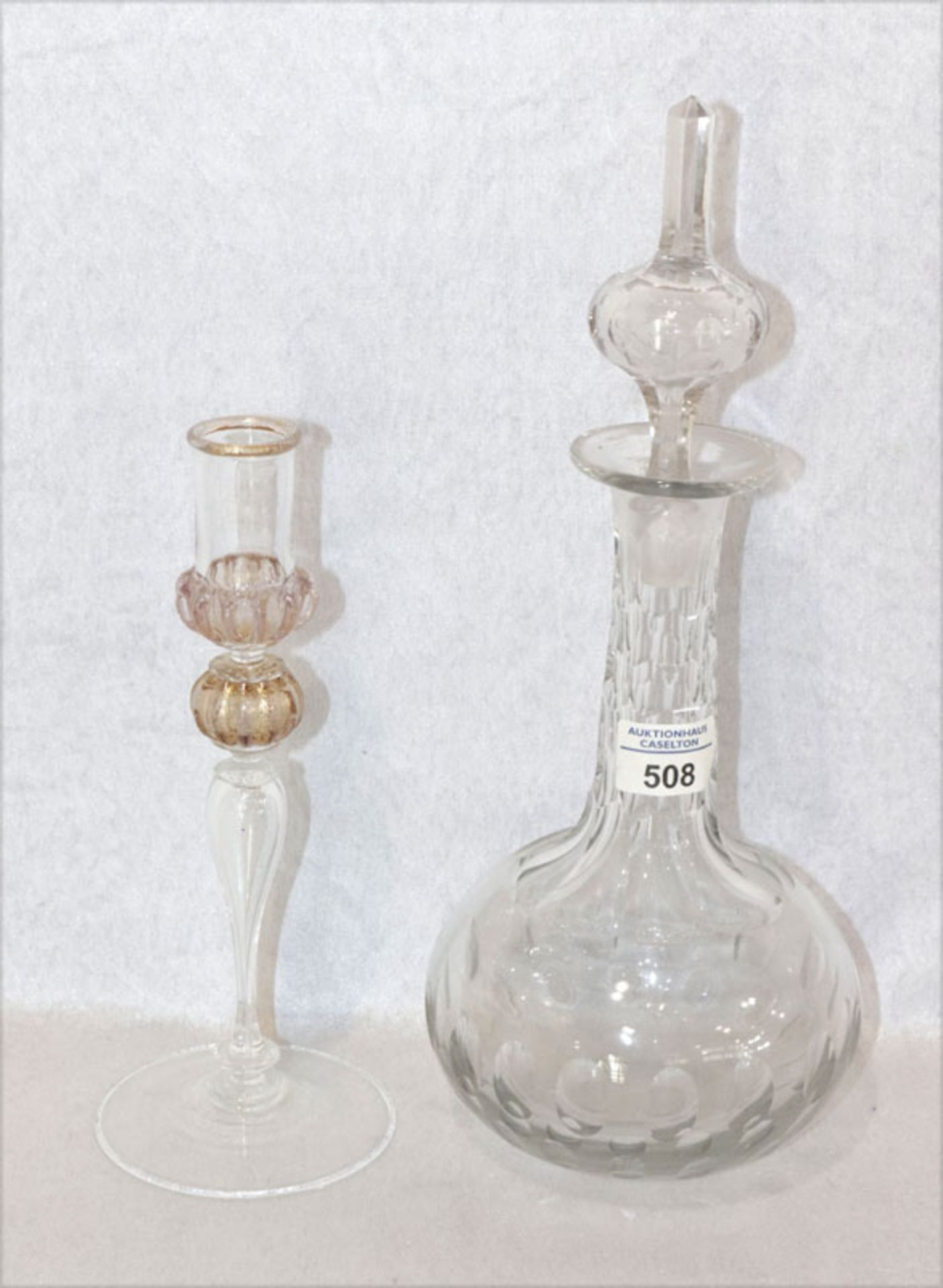 Glas-Karaffe mit Schliffdekor, H 36 cm, D 15 cm, und Glas Kerzenleuchter, H 25 cm, D 11 cm,