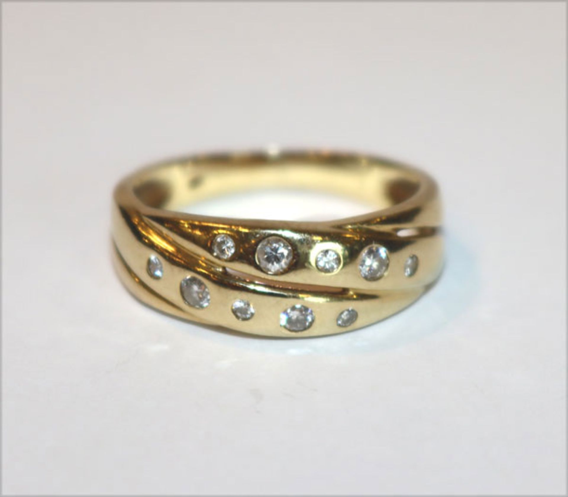 14 k Gelbgold Ring mit 10 Diamanten, 0,25 ct., 3,78 gr., mit Expertise
