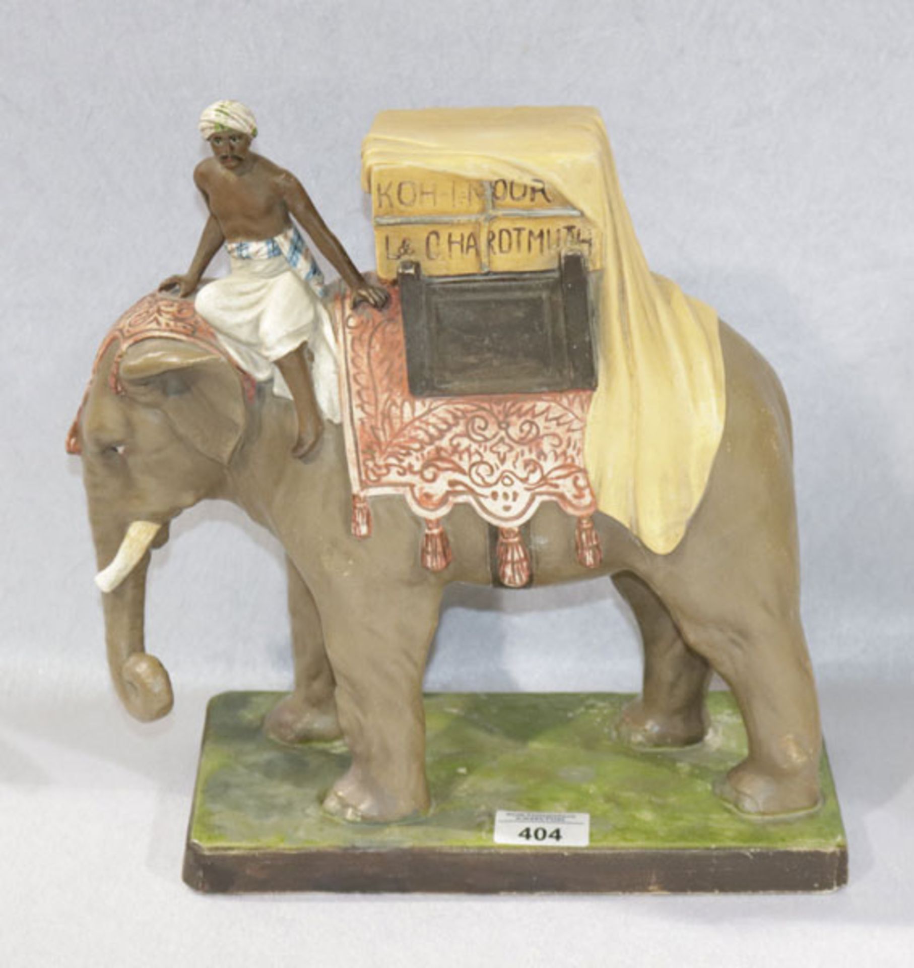 Keramik Skulptur 'Elefant mit Inder', farbig bemalt, H 32 cm, B 31 cm, T 16 cm, Altersspuren