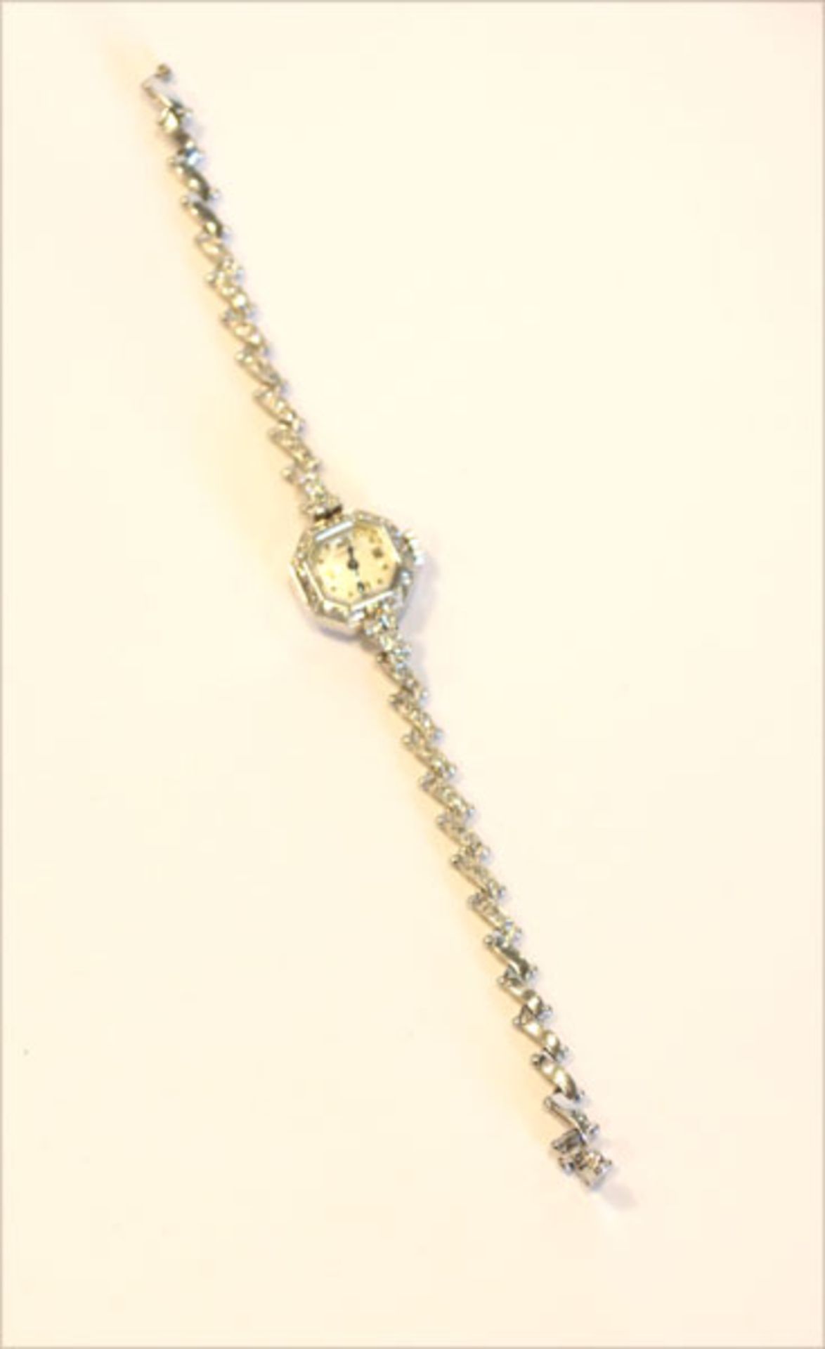 Gübelin Damen-Armbanduhr, 18 k Weißgold mit Diamanten, um 1920, 20 gr., L 16 cm, intakt
