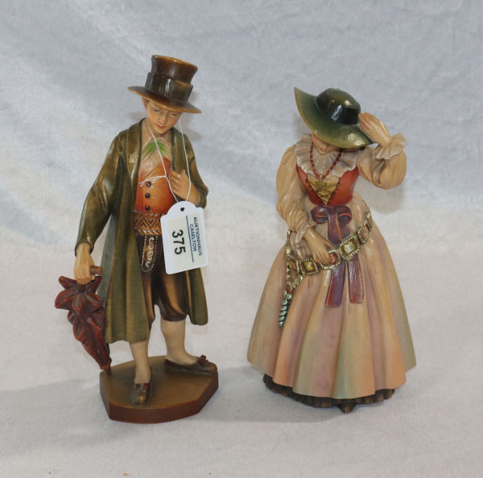 Paar Holzfiguren 'Trachtenpaar', farbig gefaßt, H 26 cm, bez. Anri, Italien