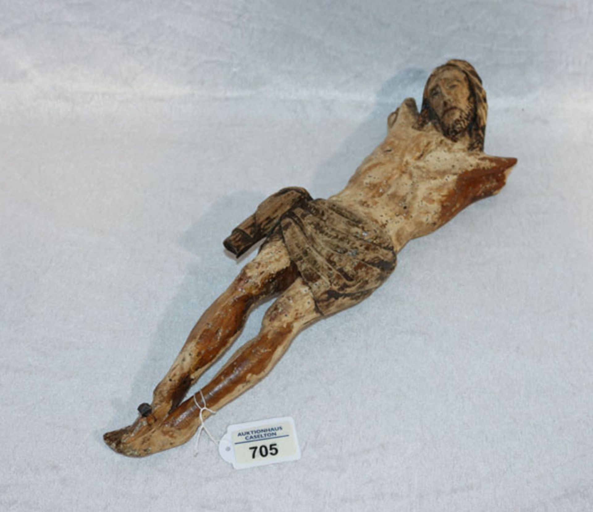 Holzfigur 'Christus', Arme fehlen, stark beschädigt durch Wurmbefall, 19. Jahrhundert, H 40 cm