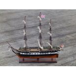 A wooden model of HMS Trincomalee, the last of Nelson's frigates, 32" across, together with a