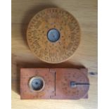 An Asian wooden compass with integral sundial and one other, 3.5" diameter. (2)