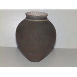 A Raku vase by Eleanor Newell, having dark brown matt exterior and cream crackled interior, AP
