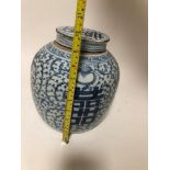 A Chinese blue & white porcelain ginger jar with cover, decorated overall scrolls with archaic style