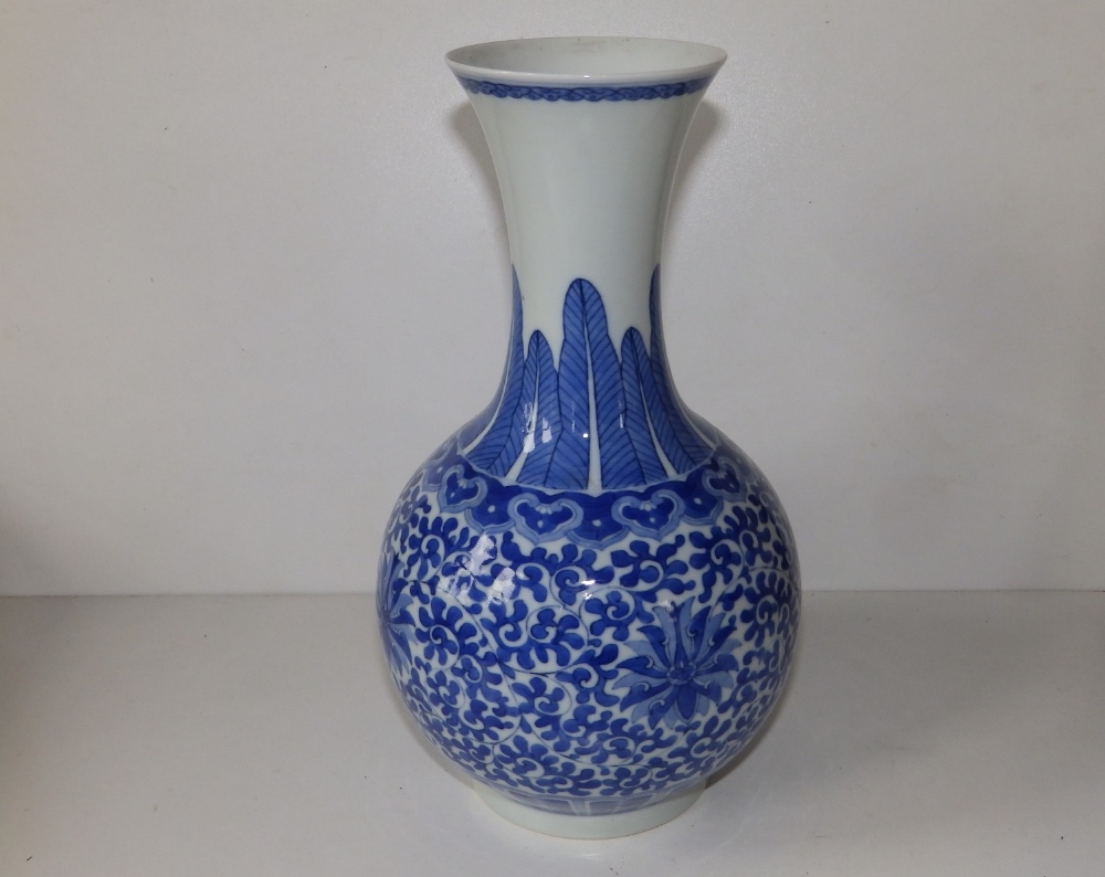 A 20thC Chinese blue & white porcelain vase, 12" high.