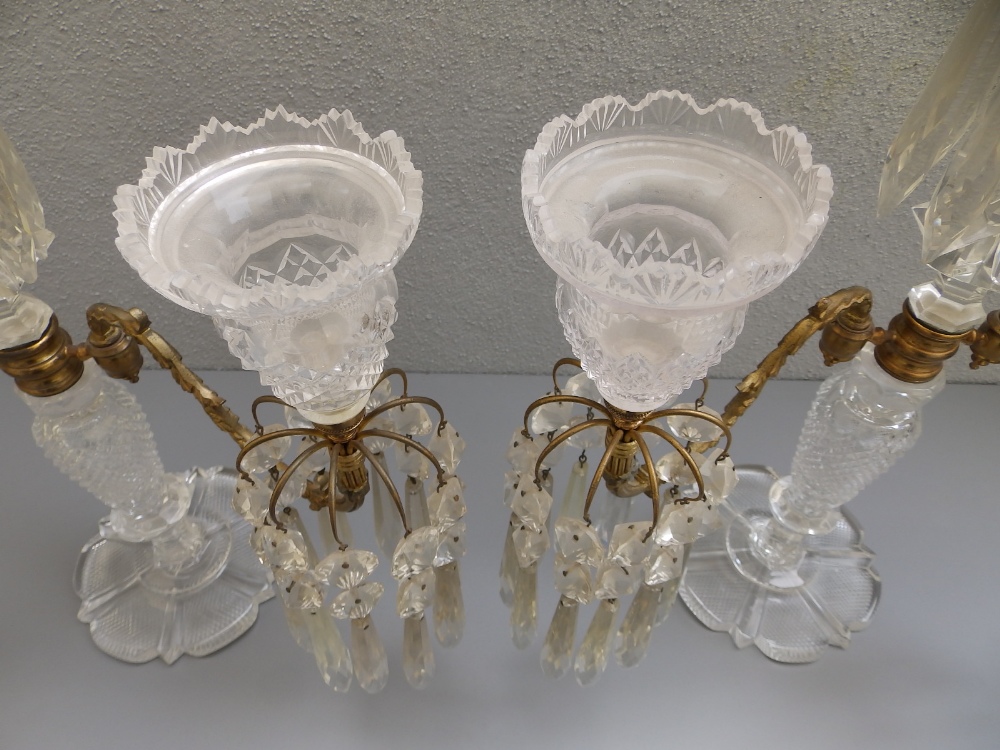 A pair of Regency cut glass ormolu mounted lustre candelabra, each having twin branches about a - Image 5 of 9