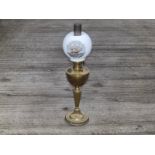 A 'Matadorbrenner' brass oil lamp, 25" high overall.