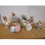 Five Beswick Beatrix Potter figures with gold backstamps; Mrs Rabbit, Tailor of Gloucester, Hunca