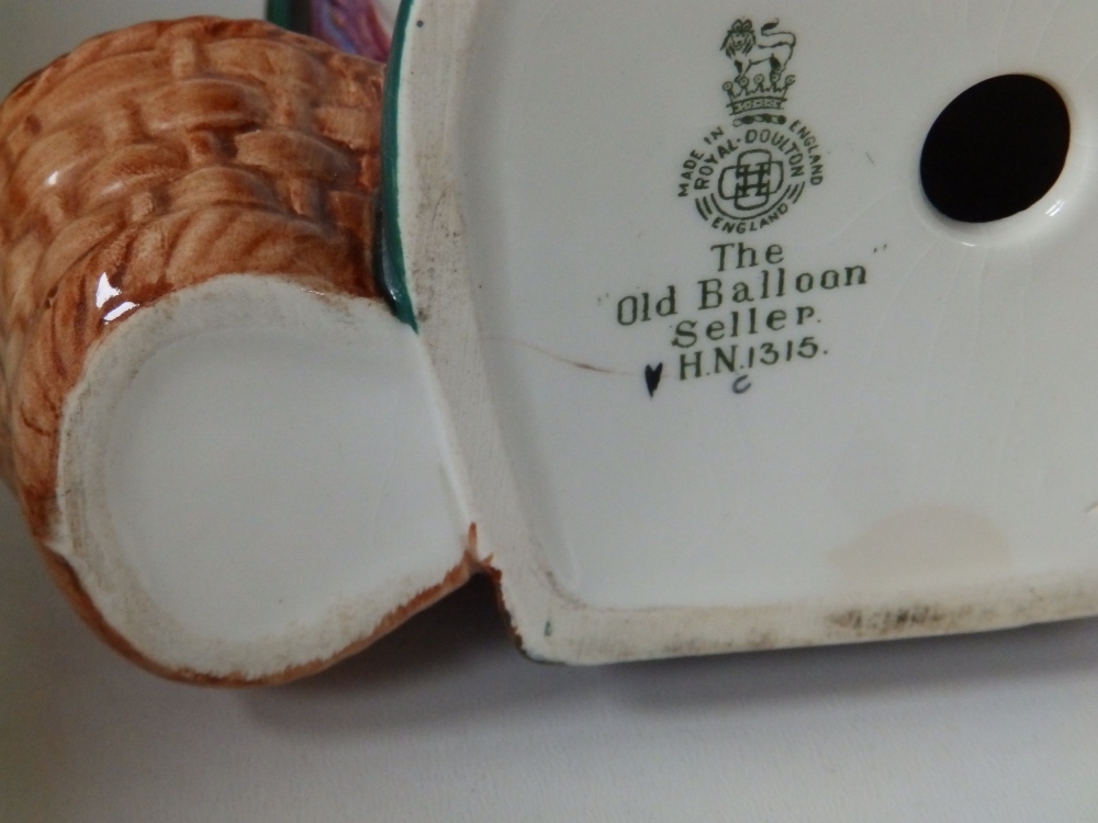 A Royal Doulton character jug - Monty D6202, Old Balloon Seller HN1315 (slight internal hairline - Image 2 of 3