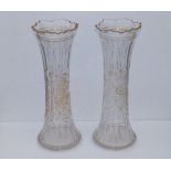 A pair of late 19thC floral engraved glass vases, of slender waisted form, 14.5" - gilding rubbed.