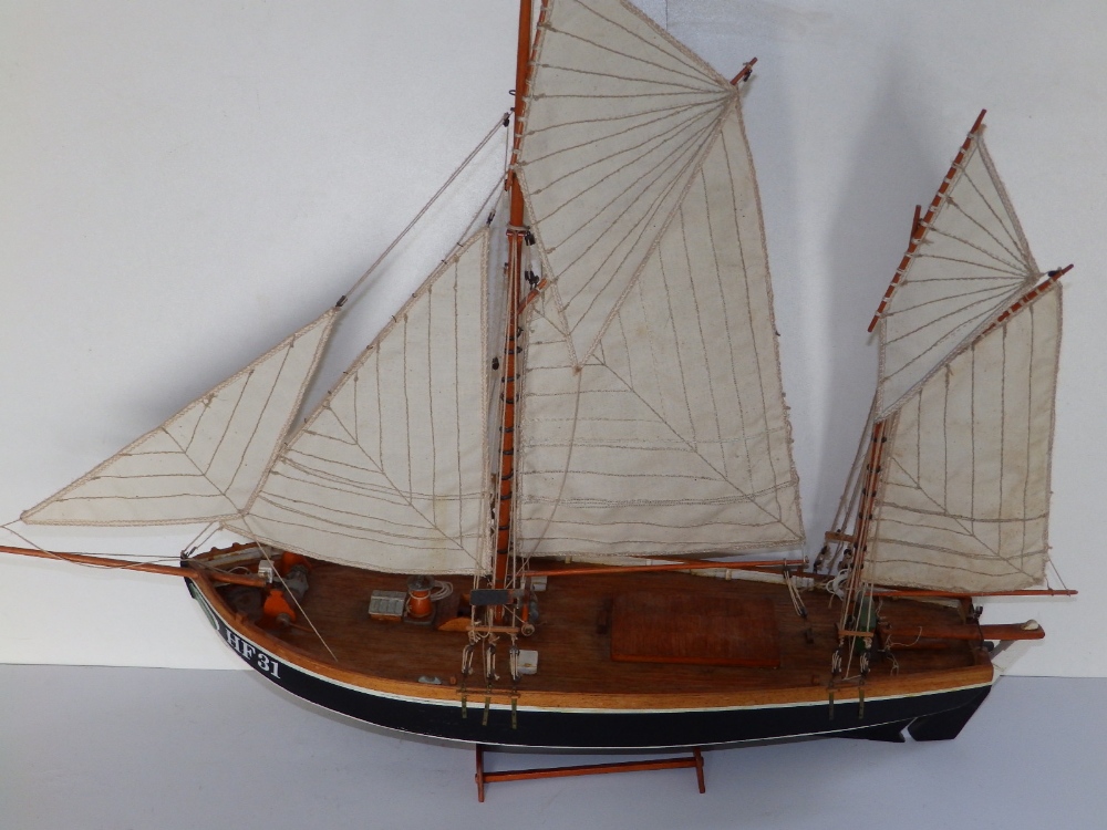 A 20thC wooden model of a small German fishing boat - 'Fishing Ever', used on the River Elbe, hull
