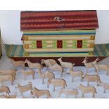 An early 20thC painted wooden Noah's Ark with 40 unpainted figures including Noah, believed to