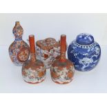 A small pair of Japanese Kutani porcelain bottle vases, 7" high, a shaped Kutani teapot - a/f, an
