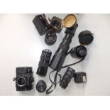 A collection of 20thC cameras and lenses, including Helios 44-2. Carl Zeiss Jena DDR, Pentacon 1.