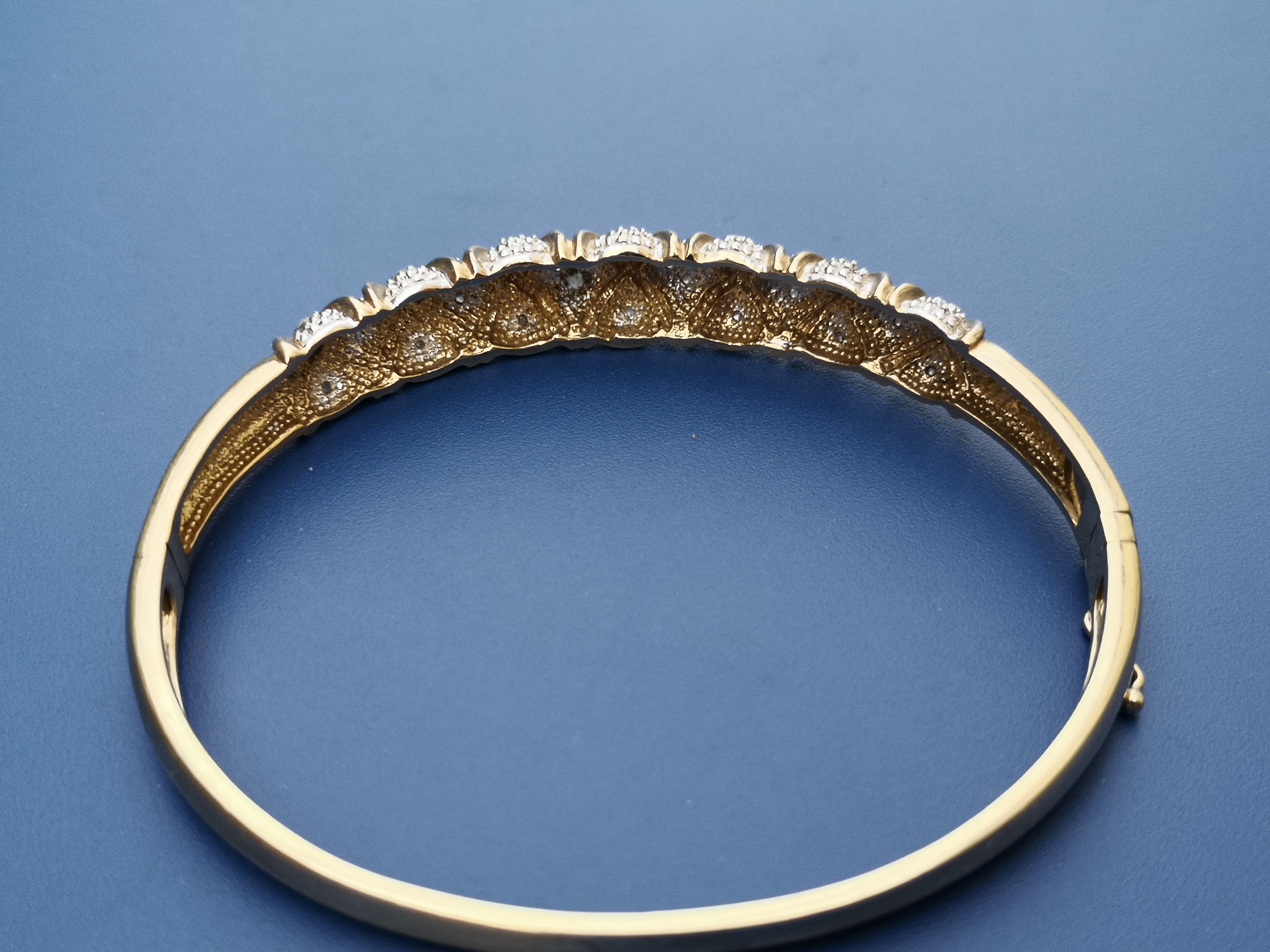 A modern diamond set 9ct bangle, 2.4" across. - Image 2 of 2
