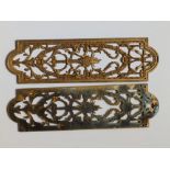 23 matching gold finish brass door finger plates, cast in an openwork neoclassical design with