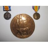 A WWI medal pair and Death Plaque awarded to 26031 Pte Edward Hawker, Wiltshire Reg, killed in