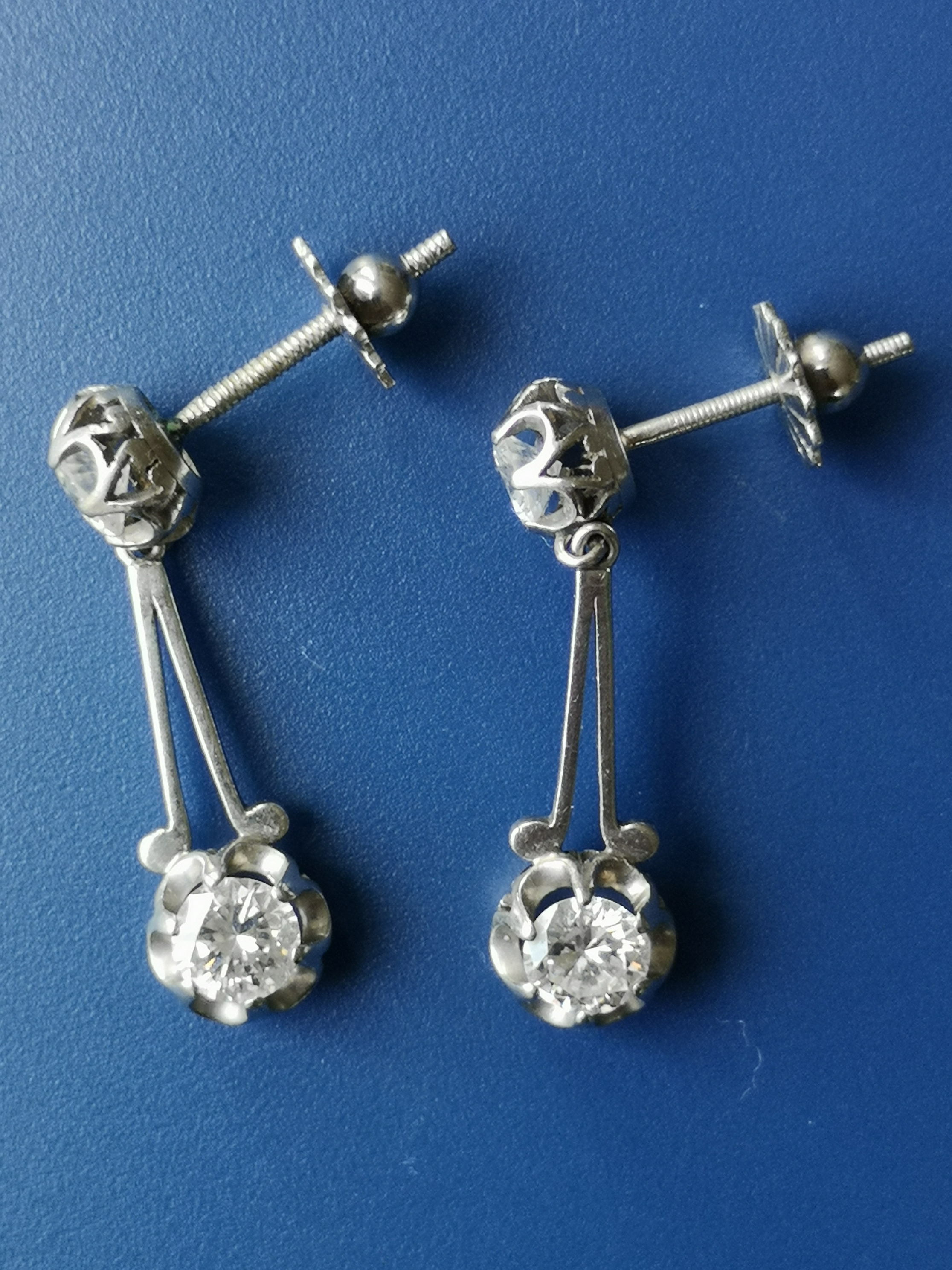 A pair of diamond set white metal drop earrings, each having two claw set brilliant cut stones, - Image 3 of 6