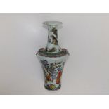 A Chinese famille verte porcelain bottle vase, having angular shoulders, decorated with an