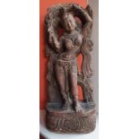 A large Indian pink stone figure depicting a standing female, 19" high.