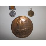 A WWI medal pair and Death Plaque awarded to 23744 Pte Ernest Weeks, Wiltshire Reg., killed in