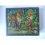 A Victorian block cube puzzle, lithographed in colours to show six designs including Little Red