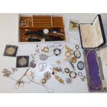 A white jewellery box & contents.