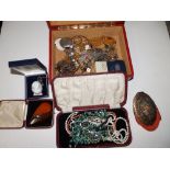 A red jewellery box and contents