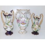 Two matching 19thC floral encrusted vases in Coalport style - one with re-stuck handle, together