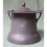 An art nouveau pewter biscuit barrel by Connell of Cheapside, 9" high including handle.